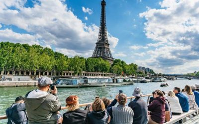 1-Hour River Seine Cruise In Paris Eiffel Tower view while enjoying a leisurely ride on the serene waters of the Seine.