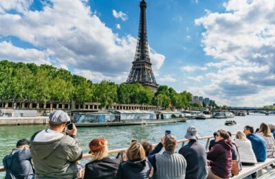 1-Hour River Seine Cruise In Paris Eiffel Tower view while enjoying a leisurely ride on the serene waters of the Seine.