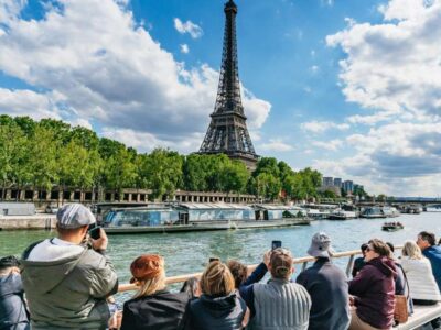 1-Hour River Seine Cruise In Paris Eiffel Tower view while enjoying a leisurely ride on the serene waters of the Seine.